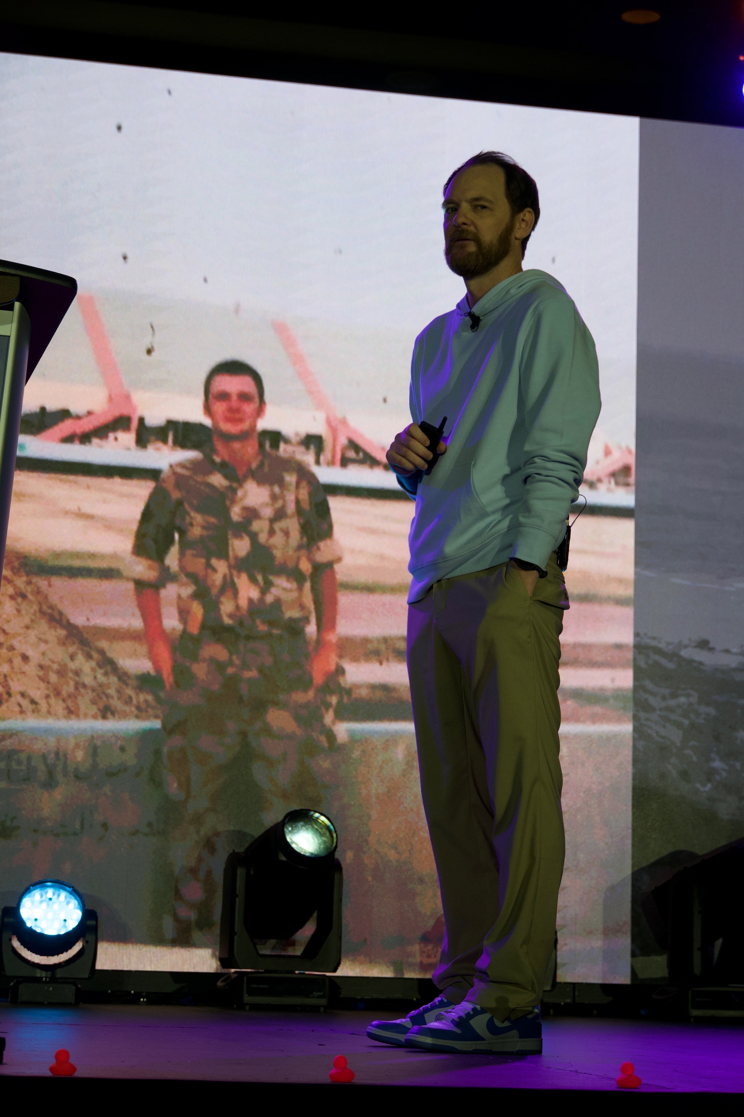 Nic Grey, founder of Pathfinder Leadership, speaking on stage
